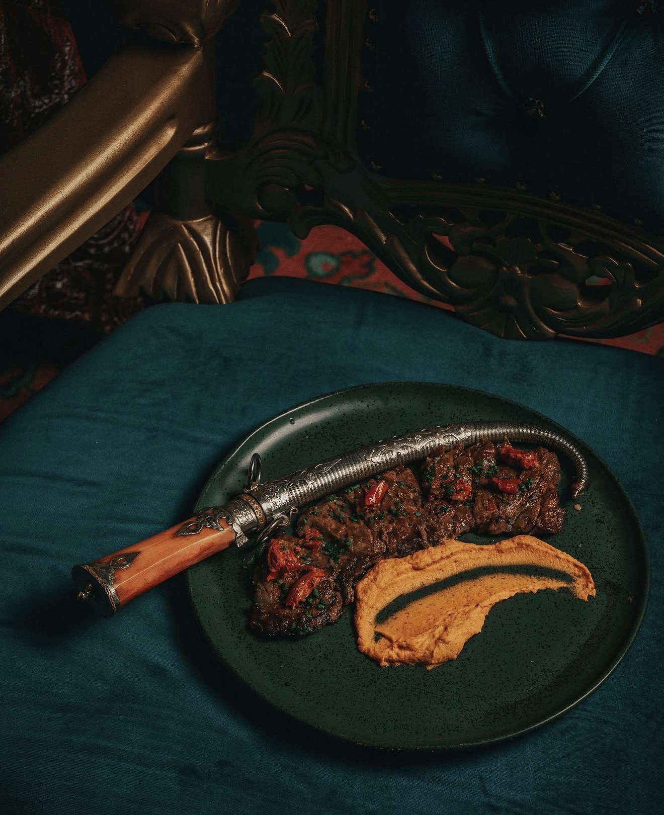 Habibi Miami River signature dish braised meat ornate dagger presentation hummus Miami River restaurant